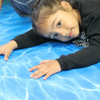 Child laying on our foam mats