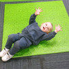 2 grass effect large interlocking foam floor play mats for children & nurseries - Child laying down view