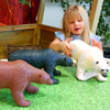 girl playing with our large toy bears