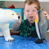 Jumbo Small World Arctic animal toys play set for children - child playing with view