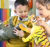 Children playing with our large safari animal toys