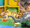 Girl playing with our large safari animal toys