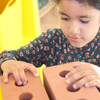 child playing with foam bricks