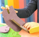 child playing with our U-Nu 140 piece eco-friendly colourful wooden natural building and construction set