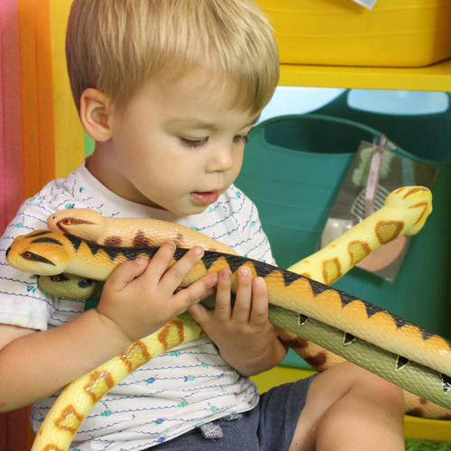 child playing with our jumbo snake toys