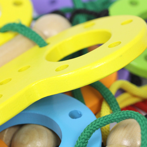 Educational butterfly threading & lacing toy for developing fine motor skills in children - close up view 2