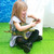 Girl playing with 2 jumbo large dinosaur toys - a 21-inch spinosaurus and a 21-inch ankylosaurus Girl playing with 2 jumbo large dinosaur toys - a 21-inch spinosaurus and a 21-inch ankylosaurus