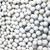 Close up photo of many activated alumina 3/16" white beads.
