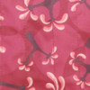 Fabric close-up - Cartwheeling Trees print in Raspberry.