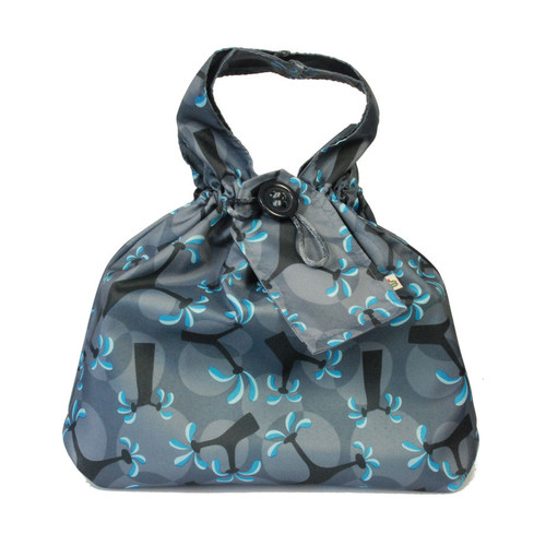 Medium fabric Gift Bag in Ocean Blue.  Shown wrapping example gift.