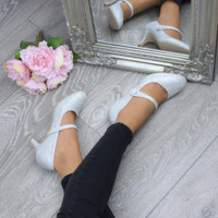 Model wearing Silver Glitter Mid Heel Mary Jane Court Shoes