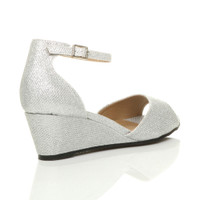 Back right side view of Silver Glitter Low Mid Wedge Heel Ankle Strap Sandals