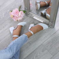 Model wearing Silver Satin Mid Block Heel Ankle Strap Sandals Court Shoes