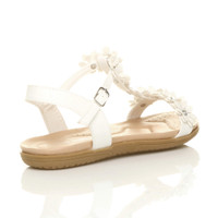 Back right side view of White PU Flat Comfort Flower T-Bar Sandals
