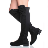 Model wearing Black Suede Low Heel Stretchy Over The Knee Boots