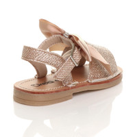 Back right side view of Gold Glitter Infants Flat Buckle Ribbon Bow Menorcan Sandals
