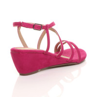 Back right side view of Fuchsia Pink Suede Mid Wedge Heel Strappy Sandals