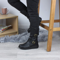 Model wearing Black PU Low Wedge Heel Biker Comfort Calf Boots