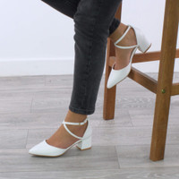 Model wearing White PU Mid Block Heel Cross Strap Two Part Ankle Strap Shoes