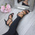 Model wearing Black Mesh Glitter Mid Heel Strappy Crossover Sandals
