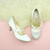 Closeup view of features of Ivory Satin Mid Heel Mary Jane Court Shoes Closeup view of features of Ivory Satin Mid Heel Mary Jane Court Shoes