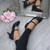 Model wearing Black Glitter Mid Heel Mary Jane Court Shoes Model wearing Black Glitter Mid Heel Mary Jane Court Shoes