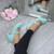 Model wearing Mint Suede Mid Heel Mary Jane Court Shoes Model wearing Mint Suede Mid Heel Mary Jane Court Shoes