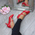 Model wearing Red Patent Mid Heel Mary Jane Court Shoes