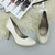 Closeup view of features of Ivory Satin High Heel Platform Court Shoes Closeup view of features of Ivory Satin High Heel Platform Court Shoes