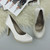 Closeup view of features of White Satin High Heel Platform Court Shoes