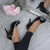 Model wearing Black Patent High Heel Platform Court Shoes