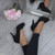 Model wearing Black Suede High Heel Platform Court Shoes