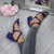 Model wearing Navy Satin Mid Block Heel Cross Strap Party Strappy Sandals
