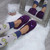 Model wearing Purple Flat Fleece Fluffy Mules Slippers