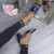 Model wearing Navy Patent Mid Block Heel Ankle Strap Sandals Court Shoes