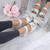 Model wearing Silver PU Low Heel Wedge Flower Comfort Sandals