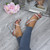 Model wearing Silver Diamante PU High Heel Barely There Strappy Buckle Evening Sandals