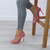 Model wearing Coral Suede High Heel Barely There Strappy Buckle Evening Sandals
