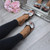 Model wearing Black Flat Jelly Diamante Bow Flip Flops Toe Post Sandals