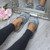 Model wearing Grey Fur Memory Foam Fluffy Bow Fur Lined Grip Sole Peep Toe Mule Slippers Sandals
