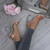 Model wearing Nude Patent High Block Heel Barely There Strappy Clear Perspex Sandals 