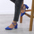 Model wearing Cobalt Blue Suede Mid Block Heel Cross Strap Two Part Ankle Strap Shoes