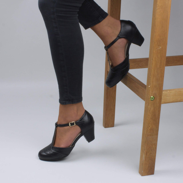 Model wearing Black PU Vintage Mid Heel T-Bar Brogue Shoes Sandals