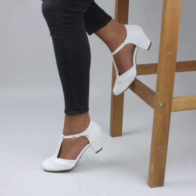 Model wearing White PU Vintage Mid Heel T-Bar Brogue Shoes Sandals