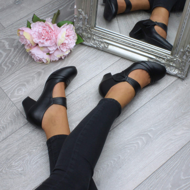 Model wearing Black PU Mid Heel Comfort Touch Close Mary Jane Court Shoes