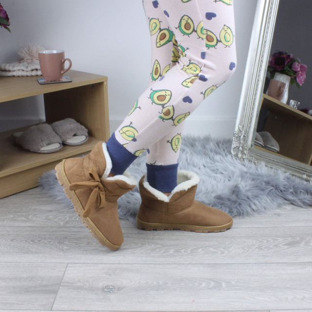 Model wearing Chestnut Suede Flat Bow Fur Lined Ankle Boots Slippers Booties