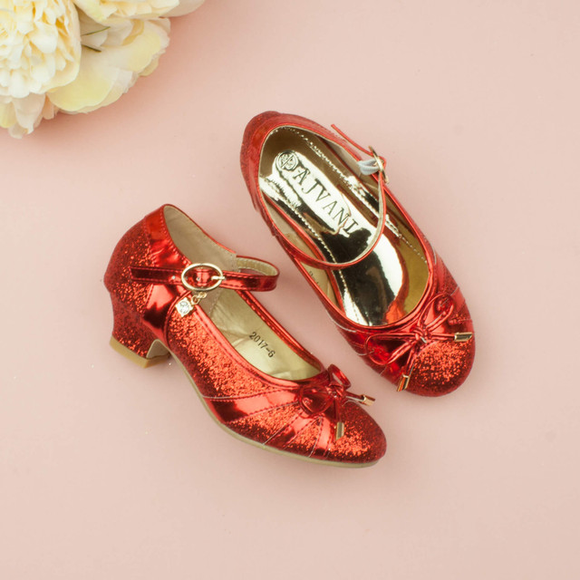 Model wearing Red Low Heel Bow Diamante Court Shoes