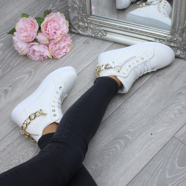 Model wearing White PU Gold Chain Lace Up Quilted Trainers