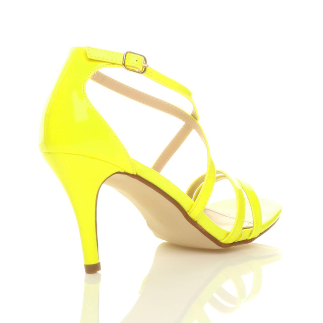 Back right side view of Neon Yellow Patent Mid Heel Strappy Crossover Sandals