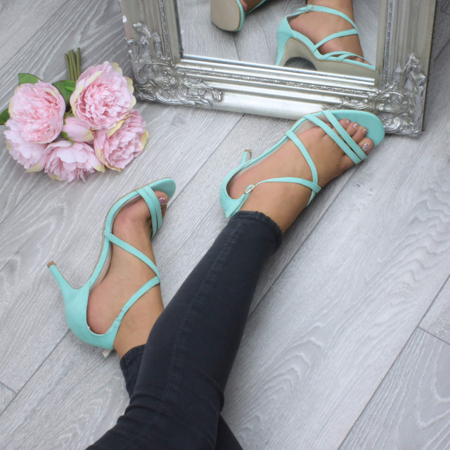 Model wearing Mint Suede Mid Heel Strappy Crossover Sandals